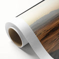 Vibrant rolled canvas artwork showcasing a stunning desert landscape, featuring rich earthy tones and intricate details, designed to enhance any space's decor.