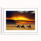 Abstract art print of a Moroccan landscape in muted earth tones on a framed white mat, ideal for dining room decor.