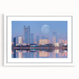 Abstract art print depicting a serene Indian landscape in muted earth tones, framed with a white mat.