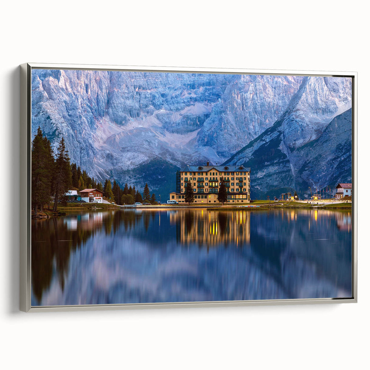Framed canvas featuring a vintage-style landscape art painting of an Austrian scenery in colorful hues.