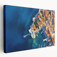 Large stretched canvas featuring a scenic European coastal town in soft pastel hues, ideal for kitchen wall art.