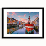 Extra large abstract art print of a colorful, textured European scenery on a black framed canvas.