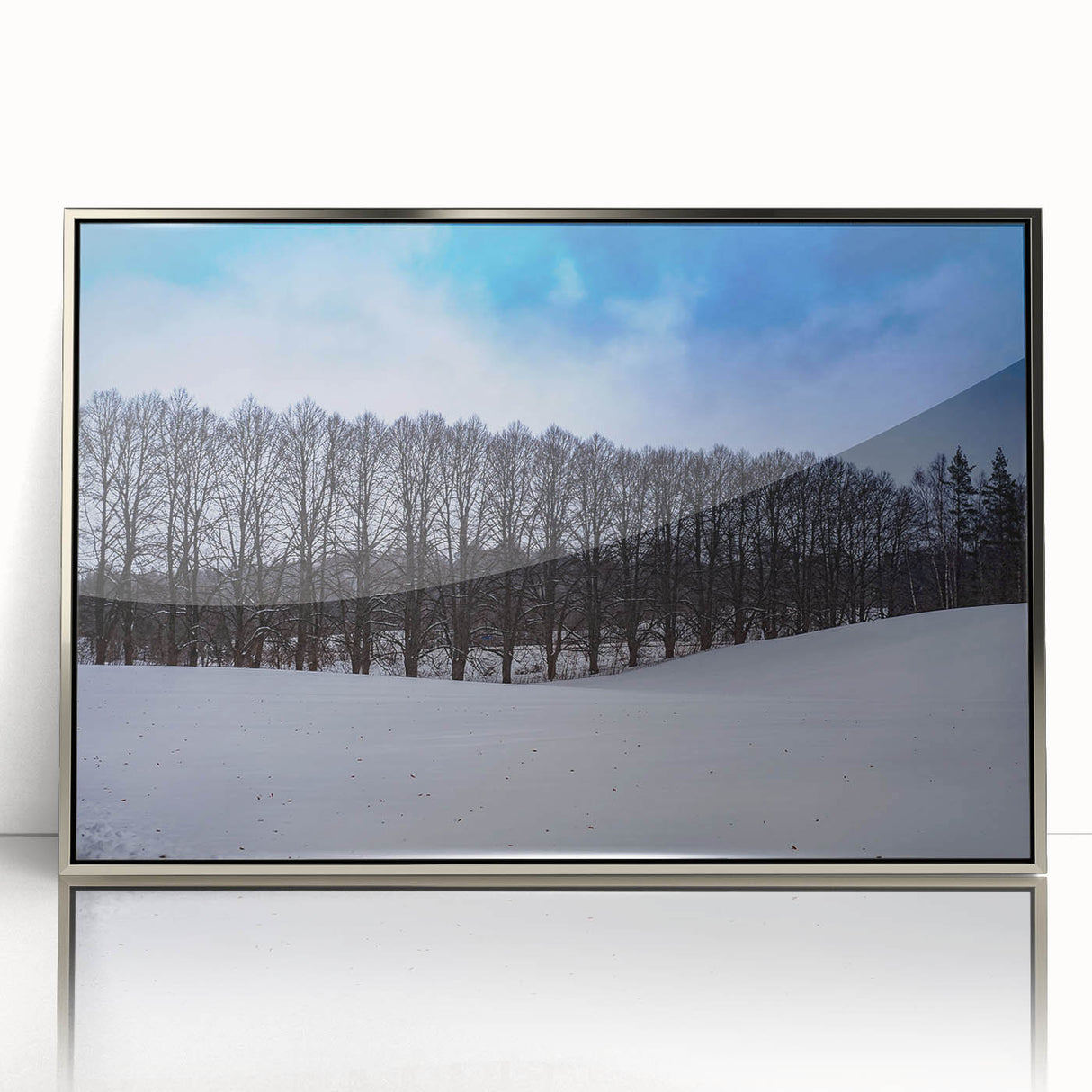Large art print of a serene European Estonian landscape in muted green and blue tones, framed in silver acrylic.