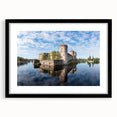 Extra large abstract art print of a colorful, textured Finnish landscape in a black frame, ideal for living room decor.