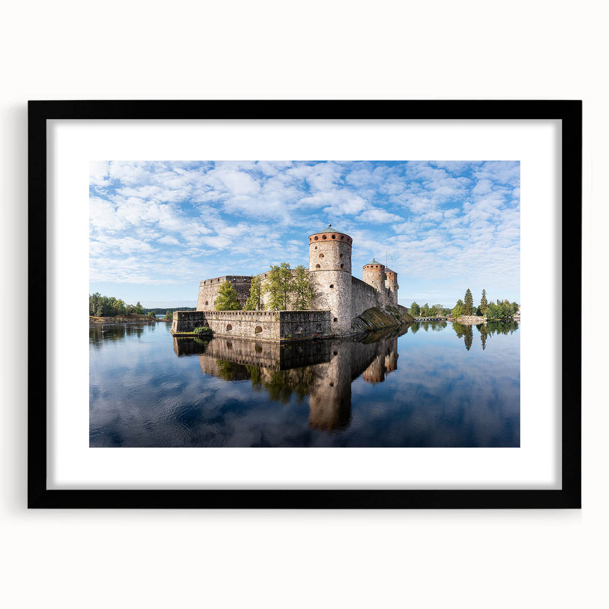 Extra large abstract art print of a colorful, textured Finnish landscape in a black frame, ideal for living room decor.