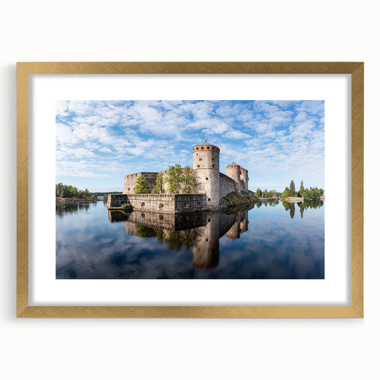 Abstract art print of a European landscape in muted blues and greens, framed in gold, suitable for dining room decor.