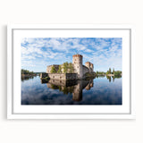 Textured abstract art print depicting a serene Finnish landscape in muted blues and greens, framed with a white mat.