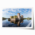 Extra large rolled print of a serene Finnish landscape with lush greenery and water, in muted green and blue tones.