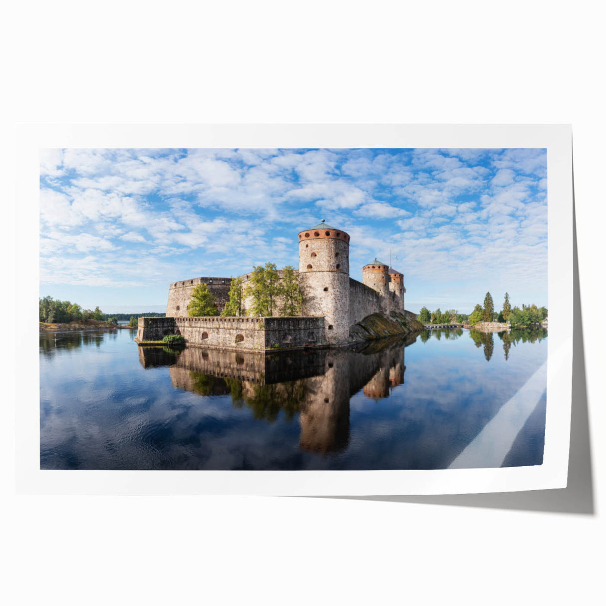 Extra large rolled print of a serene Finnish landscape with lush greenery and water, in muted green and blue tones.
