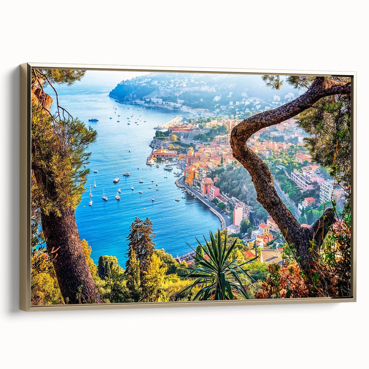 Framed canvas wall art featuring a vintage-style landscape of Provence with muted gold and black tones.