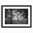 Abstract art print of colorful textured Barcelona scenery in a black frame, ideal for living room decor.