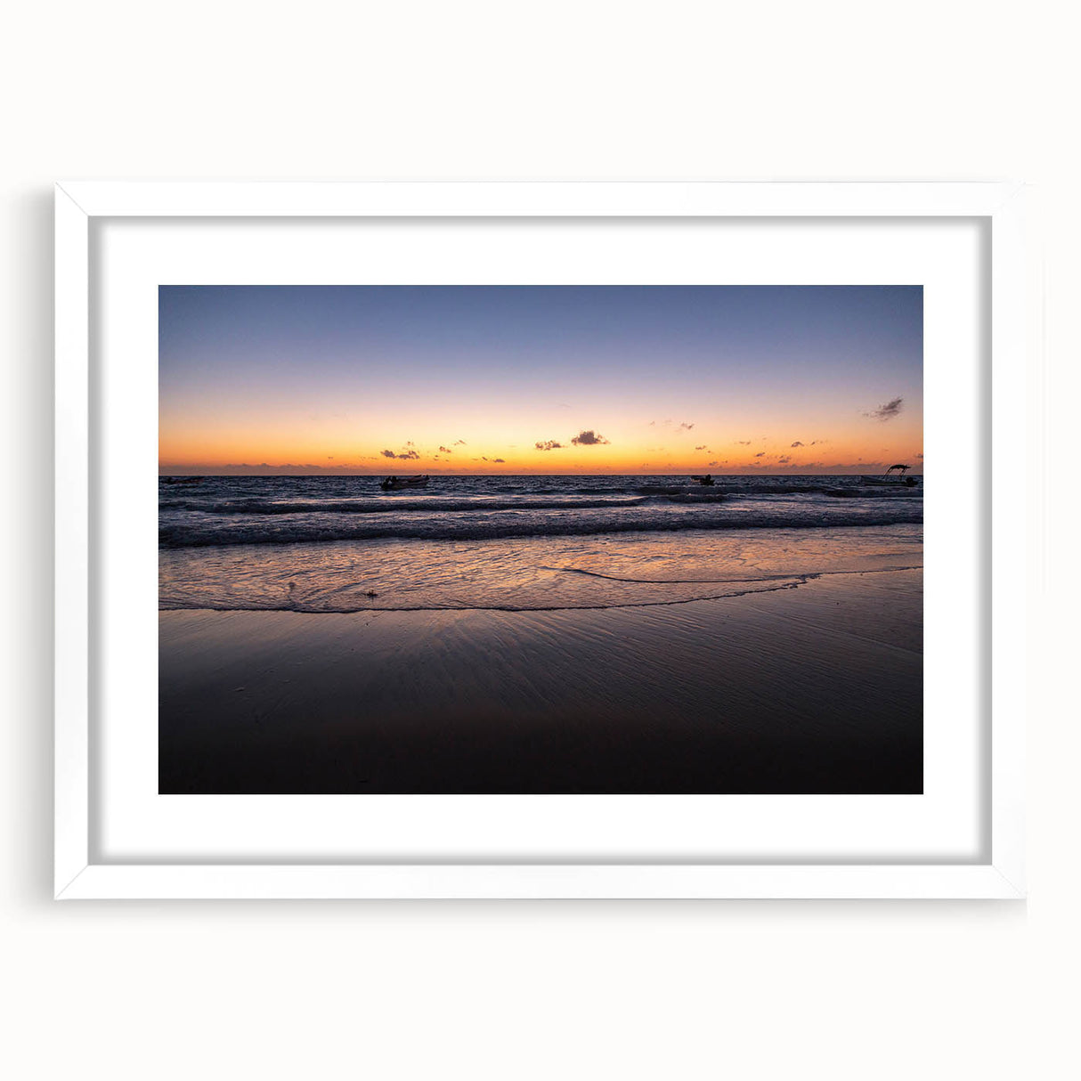 Abstract art print of Yucatán scenery in muted green and blue tones, framed with a white mat, ideal for dining room decor.