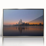 Mid-century modernist art featuring the Abu Dhabi skyline in muted silver tones on a framed acrylic print.
