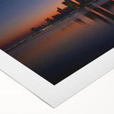 Art deco poster of Abu Dhabi skyline in muted gray and blue tones on rolled canvas, ideal for dining room wall art.