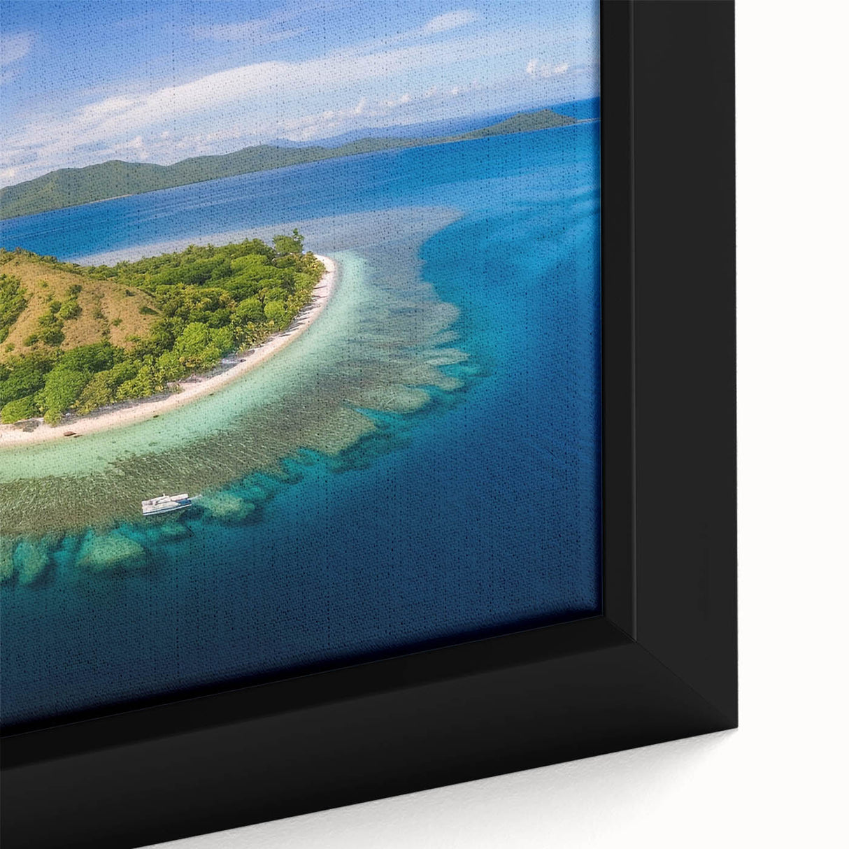 Black wall art featuring a textured close-up of Fiji scenery on a framed canvas, with vibrant color accents.