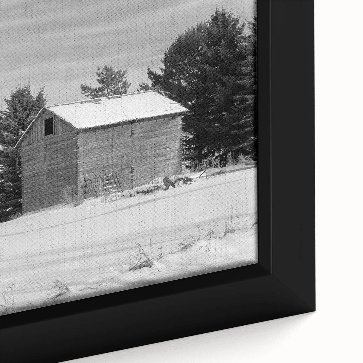 Close-up of textured black wall art featuring a colorful Idaho scenery on a framed canvas, ideal for living room decor.