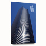Acrylic print of a large abstract depiction of the Seattle skyline in cool blue and gray tones.
