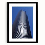 Extra large abstract art print of Seattle skyline in vibrant, colorful hues on a black framed canvas.