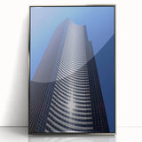 Mid-century modernist art depicting Seattle skyline in muted gray and blue tones, framed acrylic print.