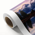 Art deco poster of the Grand Tetons in muted earth tones on rolled canvas, suitable as nursery wall art.