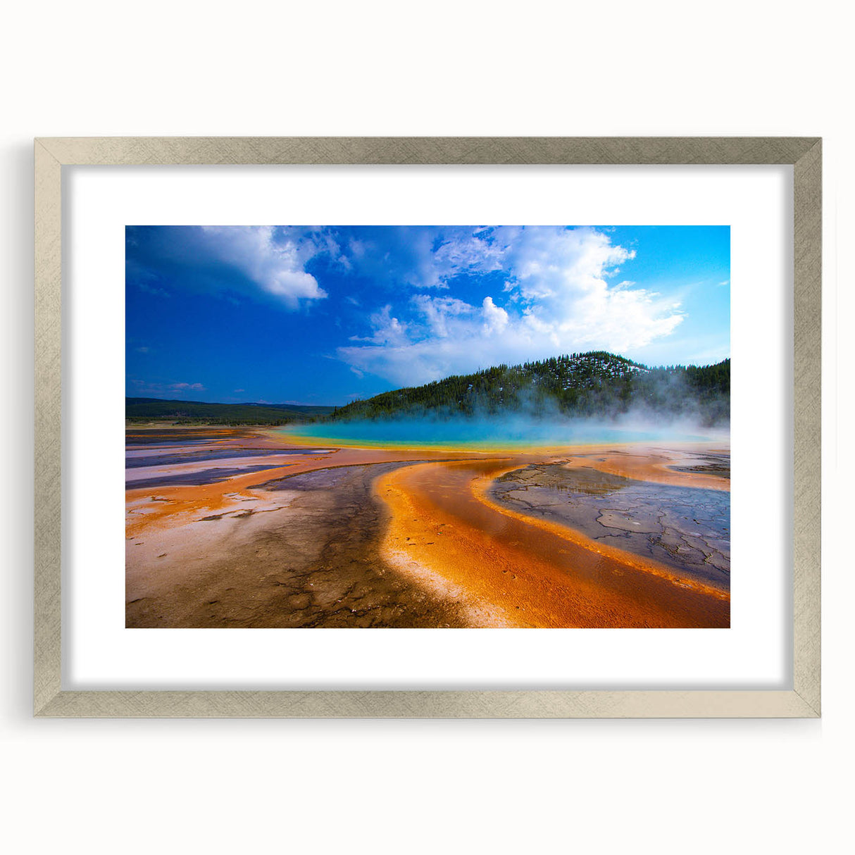 Textured abstract art print depicting Yellowstone scenery in muted earth tones on a silver-framed mat.