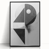 Framed abstract minimalist wall art showcasing a black acrylic design, set against a white background, ideal for modern home decor or office aesthetics.