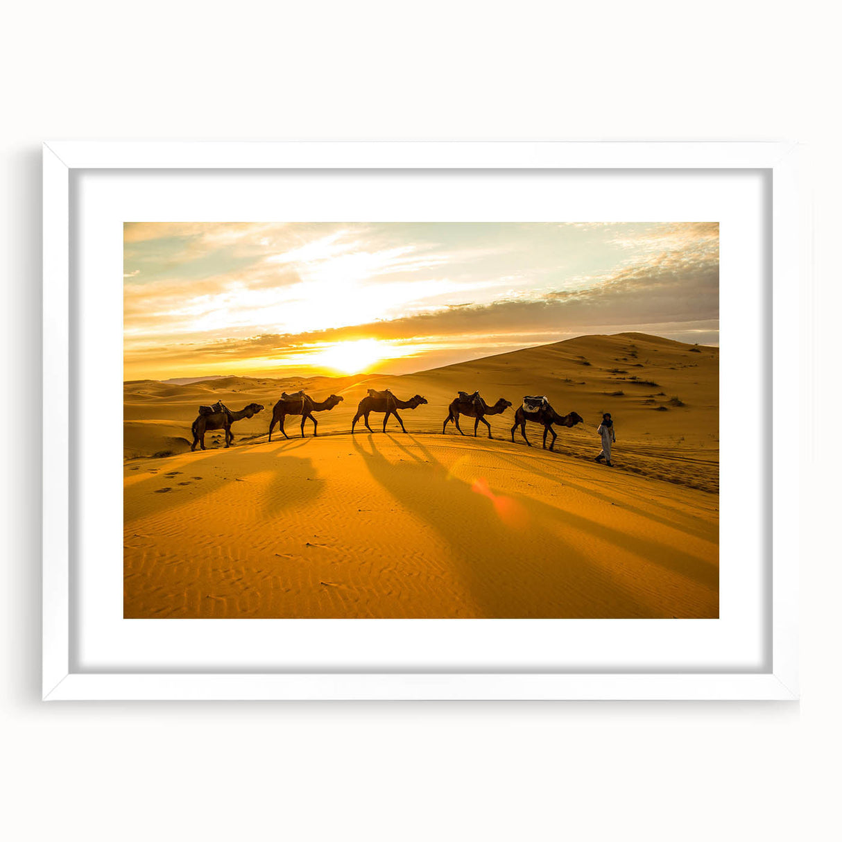 Abstract art print of a Moroccan landscape in earthy tones on a framed white mat, suitable for dining room decor.