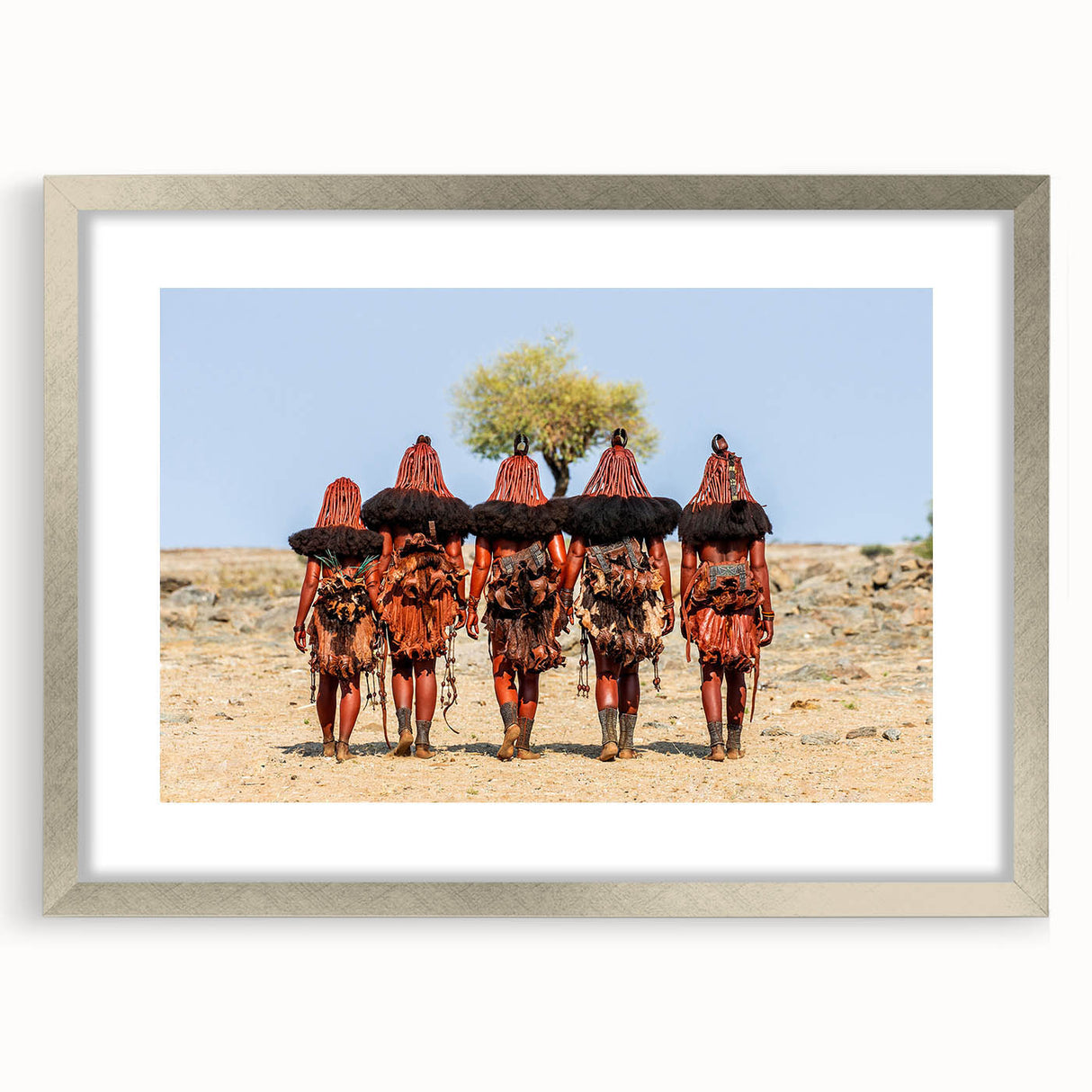Abstract art print of a Namibian landscape in muted earth tones on a silver-framed canvas, ideal for dining room decor.