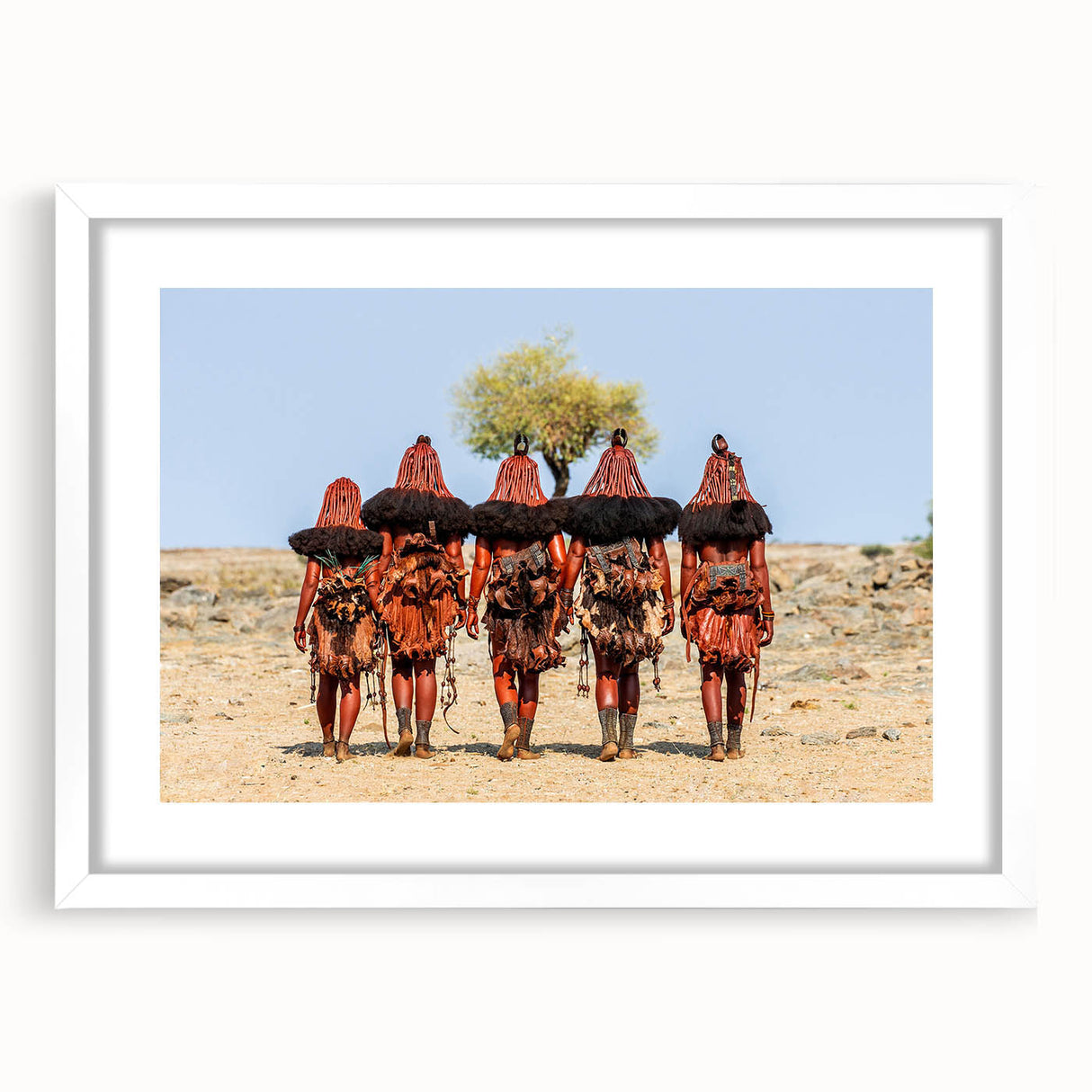 Extra large abstract art print depicting a textured African scenery in muted earth tones, framed with a white mat.
