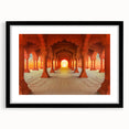 Abstract art print of a colorful, textured Indian landscape on a large canvas, framed in black, ideal for living room decor.