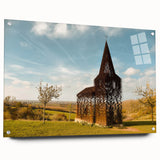 Large abstract wall art featuring European scenery in muted earth tones on acrylic glass.