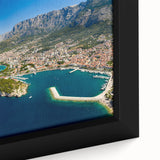 Black wall art featuring a textured Croatian landscape scene with colorful art elements, framed canvas.