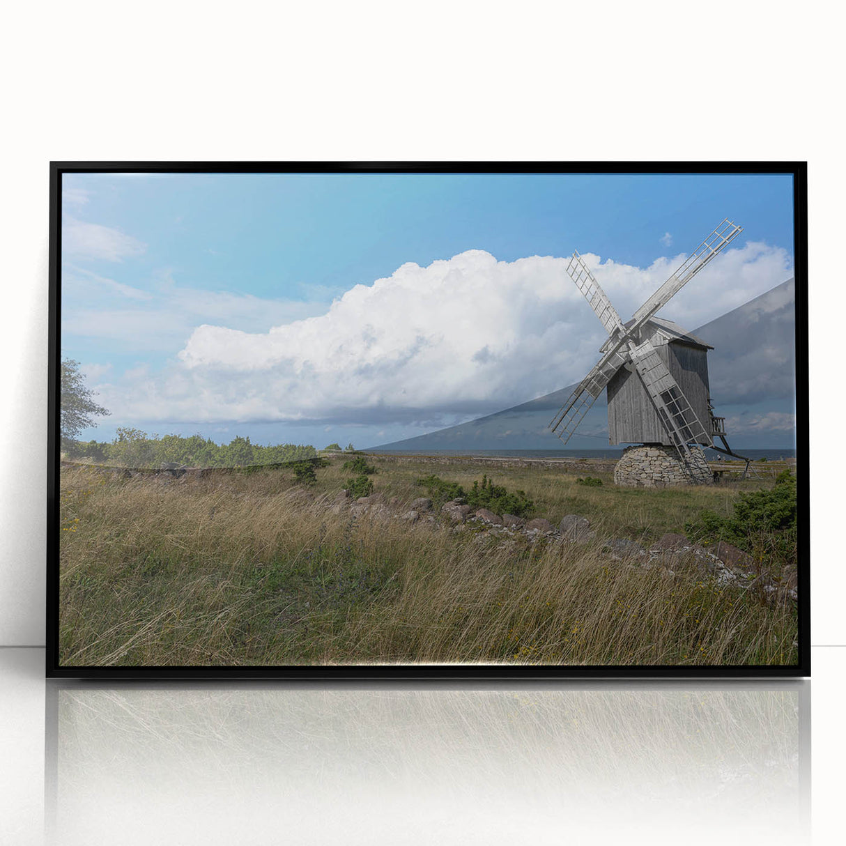Large abstract wall art depicting a European Estonian landscape in muted earth tones, framed in black acrylic.