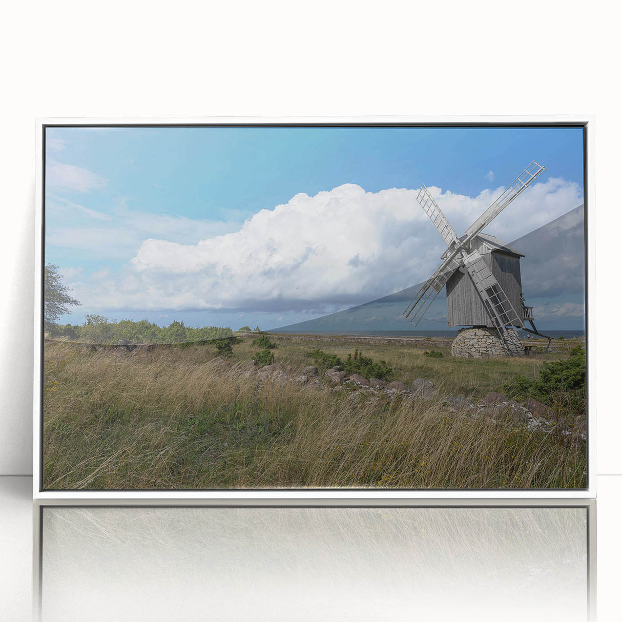 Mid-century modernist art depicting a European Estonian landscape in muted earth tones, framed in white acrylic.
