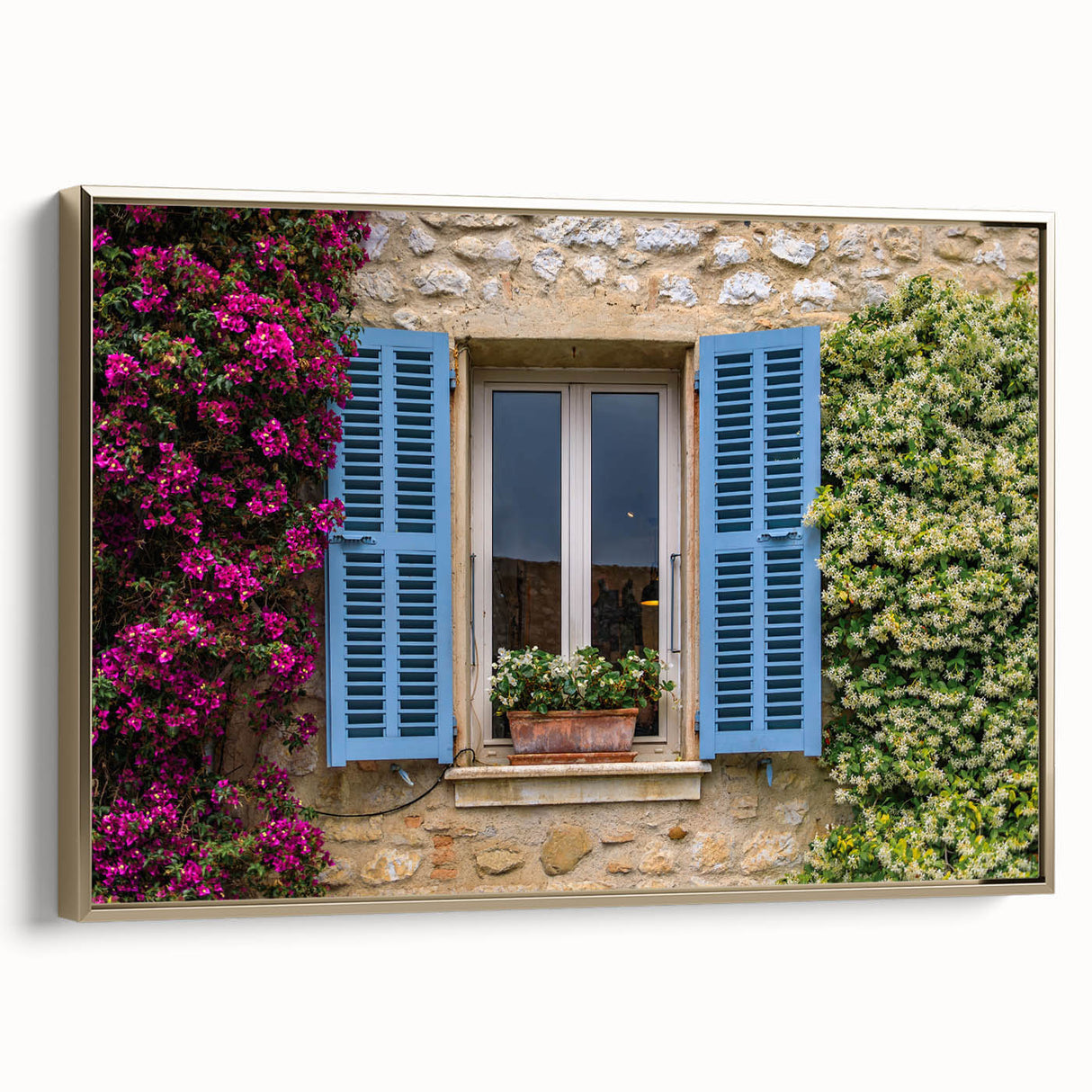 Framed canvas featuring a vintage-style landscape painting of southern France, with muted earth tones.