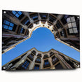 Acrylic glass print of a large abstract depiction of Barcelona, featuring vibrant, varied hues, ideal for dining room decor.