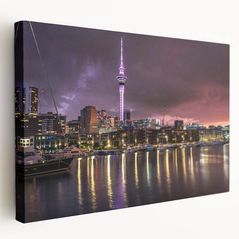 Side view of a stretched canvas depicting the Auckland skyline in muted watercolor shades, suitable for kitchen wall art.