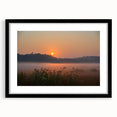 Abstract art print depicting vibrant, colorful scenery of Connecticut, framed in black, suited for living room decor.