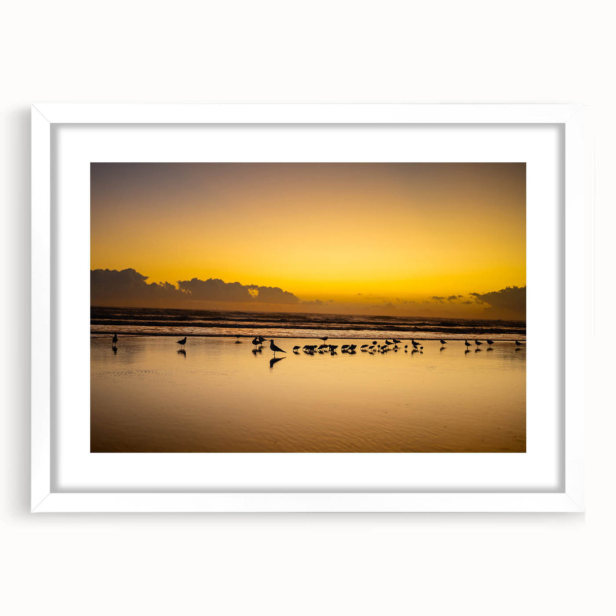 Abstract art print depicting Daytona scenery in muted blue and white tones on a framed canvas.