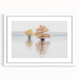 Abstract art print of a Louisiana landscape in muted earth tones, framed with a white mat, suitable for dining room decor.