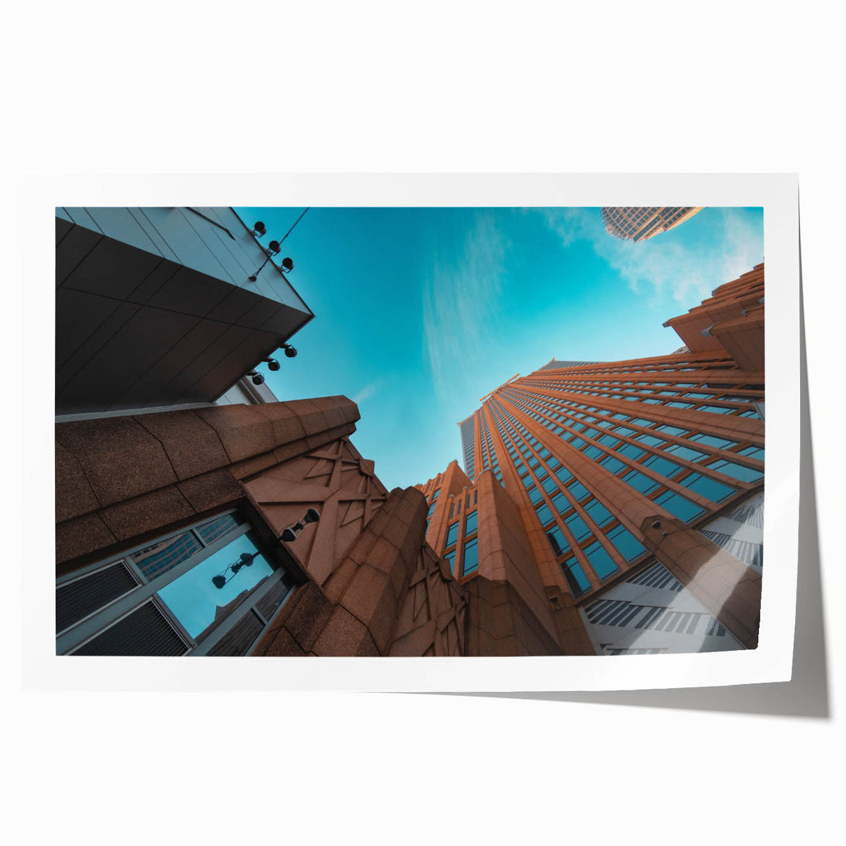 Panoramic view of Charlotte skyline in muted gray and blue tones on a rolled canvas, ideal for dining room wall art.
