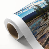 Art deco poster of Yellowstone scenery in pastel shades on rolled canvas, suitable as nursery wall art or for dining rooms.