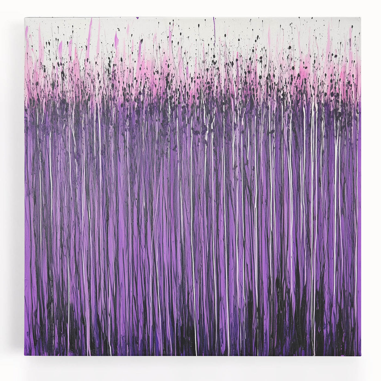 Abstract floral canvas artwork showcasing vibrant colors like pink, blue, and green in an elegant arrangement, perfect for modern home decor. Features a stretched design for easy hanging, adding a touch of sophistication to any space.