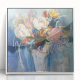Framed acrylic artwork displaying vibrant abstract florals in shades of pink, blue, and green, set in a sleek white frame, ideal for modern home decor.