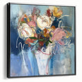 Framed canvas artwork showcasing vibrant abstract floral designs in rich colors, presented in a sleek black frame, perfect for modern home decor.