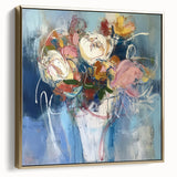 Framed canvas art featuring an abstract floral design in silver and gold tones, perfect for modern decor, showcasing elegant textures and vibrant colors.