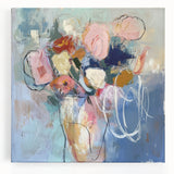 Vibrant abstract floral stretched canvas artwork displayed against a neutral background, showcasing intricate designs in shades of pink, blue, and green, perfect for modern home decor.