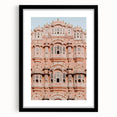 Elegant black frame showcasing a landscape painting of a majestic castle, complete with a white mat for added contrast, perfect for home decor enthusiasts. This framed artwork captures the beauty of historical architecture and adds a touch of sophistication to any room.