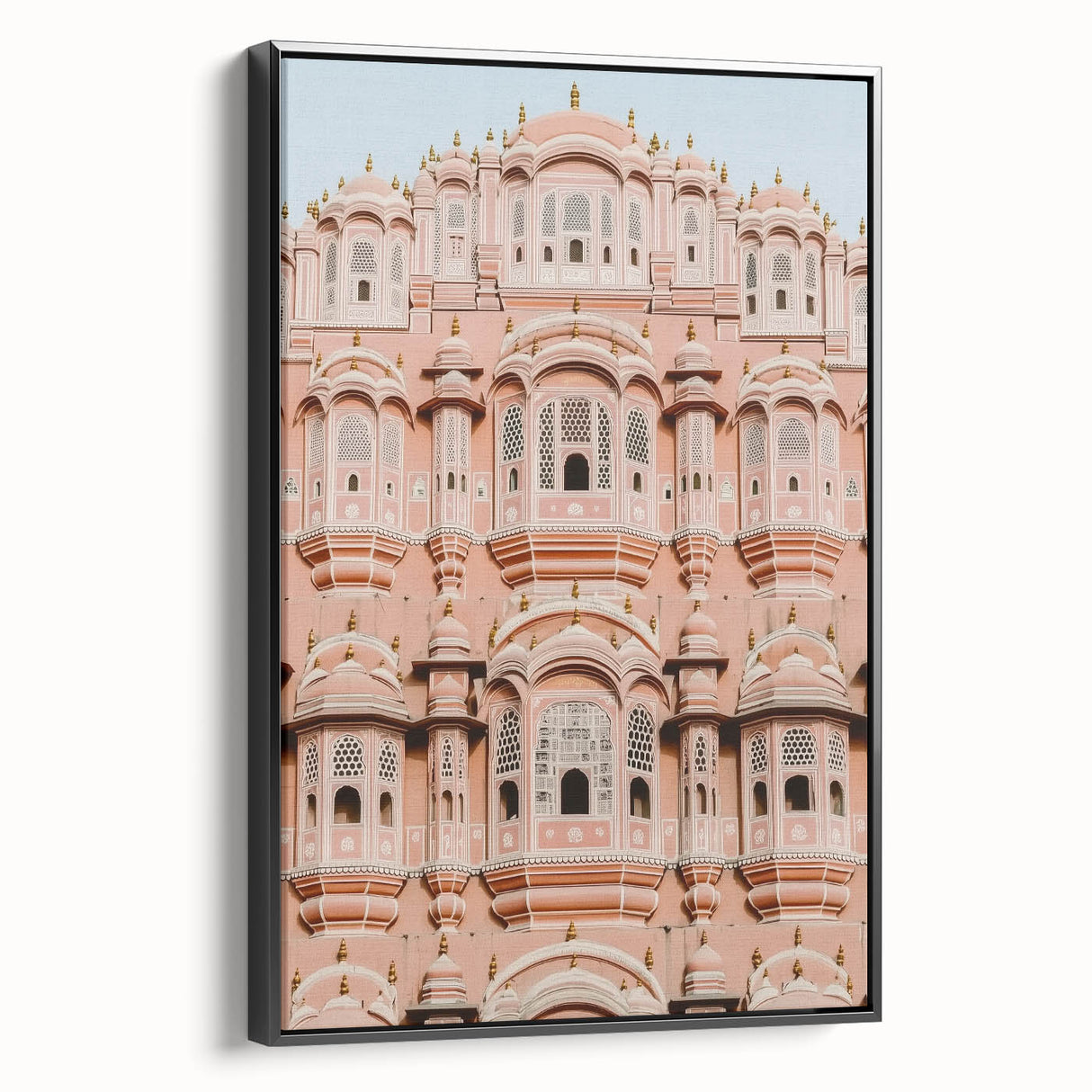 Framed canvas artwork showcasing a detailed landscape of a majestic castle, presented in a sleek black frame, ideal for enhancing home decor and adding elegance to any room.