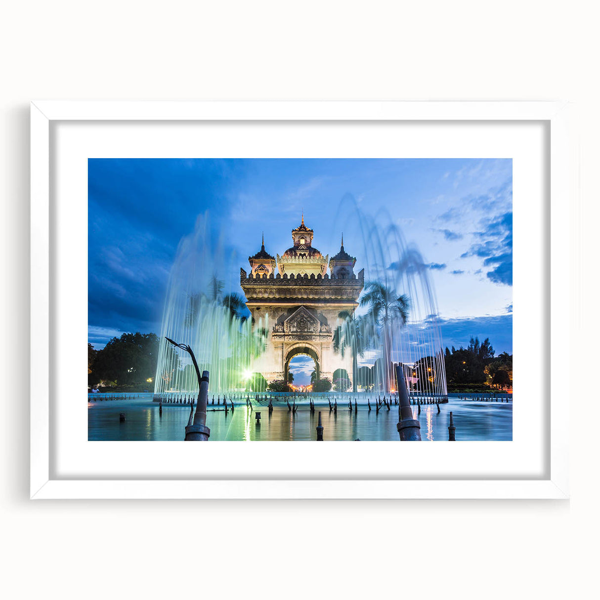 Abstract art print featuring a serene Laotian landscape in muted green and blue tones, framed with a white mat.
